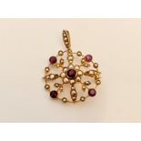 A stamped L & Co. 9ct yellow gold Edwardian style seed pearl and amethyst circular brooch