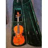 A Stentor Student violin 7/8 in case.