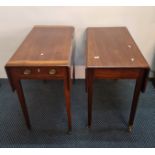 Two mahogany drop leaf side tables with single drawers.
