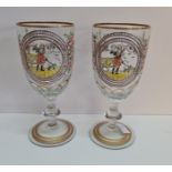 A pair of German style large glass goblets with hand painted scene of one man and his dog height