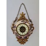 An Eugene Farcot style wall clock with porcelain round body and visible movement.