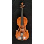 A early 18th century violin signed and dated to back by the fist four owners fist name is hard to