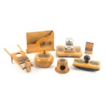 Mauchline ware - seven pieces, desk accessories, comprising a glass inkwell on stand (Alloway Kirk /