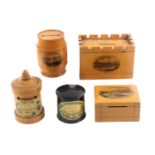 Mauchline ware, five money boxes, comprising a rectangular example with crenalated top (
