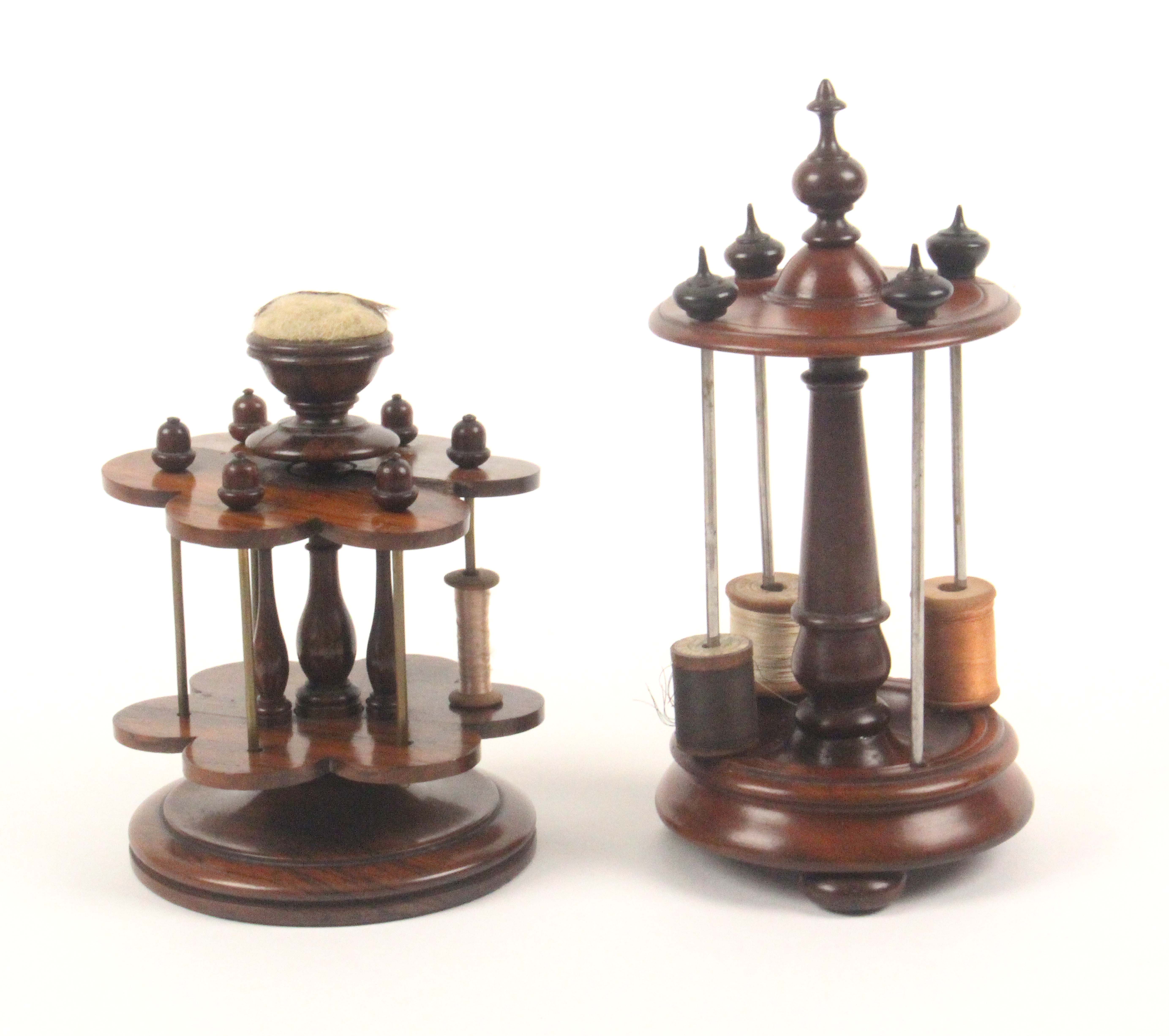 Two reel stands, mid 19th Century, comprising a rosewood example on circular base, with two