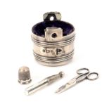 A rare silver miniature sewing companion for a doll of pail form, blue velvet infill with unmarked