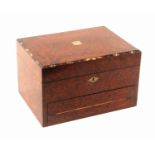 A late Victorian amboyna wood combined sewing and writing box, circa 1890, of rectangular form,