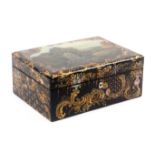 A good papier mache sewing box, circa 1850, of rectangular form, the sides decorated in gilt on