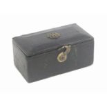 A Georgian green leather rectangular sewing box for a child, circa 1820, the chamfered lid with