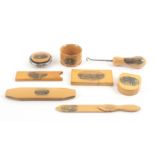 Mauchline ware - eight pieces, comprising a button hook (Bamborough Castle), 14cms, a pull off top