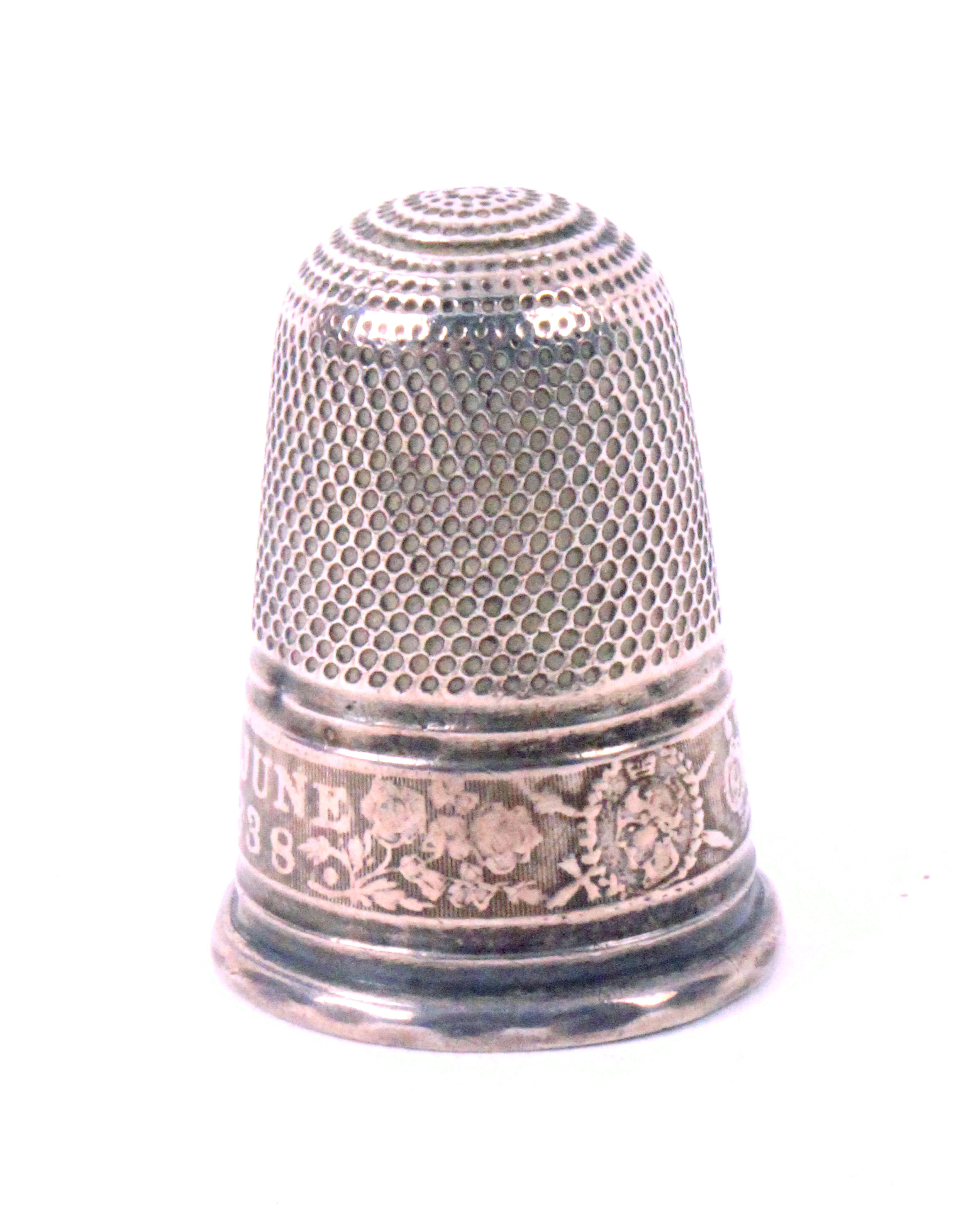 A rare English silver Queen Victoria commemorative thimble, the frieze with oval portrait