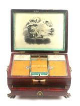 A Regency red leather covered sewing box, of sarcophagol form raised on brass lion paw feet, brass