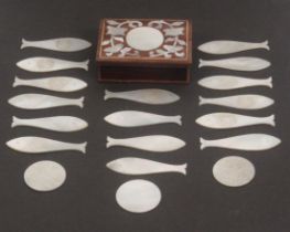 A group of late 18th Century Chinese export mother of pearl armorial gaming counters, in original