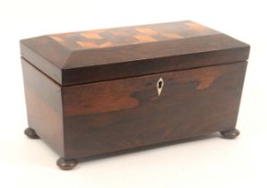 A Tunbridge ware rosewood tea caddy of sarcophagol form labelled for Cheesman, raised on bun feet,