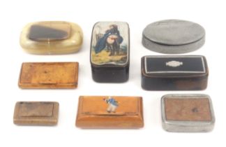 Eight various snuff boxes, comprising an oval pale horn example, 7cms, an ebonised wooden example