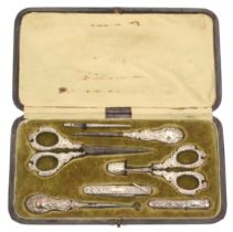 A silver eight piece sewing set contained in a leatherette rectangular case, circa 1900, the case
