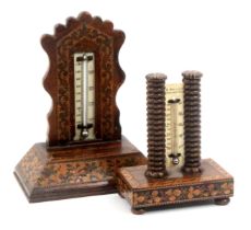 Two Tunbridge ware desk thermometers, one raised on bun feet and mosaic rectangular base