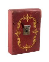 A French Sewing Companion, circa 1850, of rectangular form in gilt tooled red leather the case