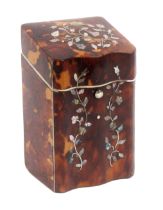 A tortoiseshell and inlaid sewing companion, circa 1850, the serpentine front and sloping lid inlaid