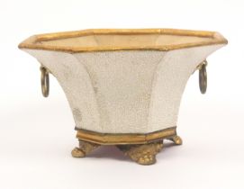 A rare Regency period table sewing basket of octagonal trumpet form, raised on gilt metal paw and