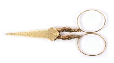 A good pair of Dutch gold mounted scissors complete with gold sheath, steel diamond section tapering