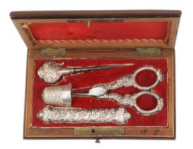 A French silver four piece sewing set in inlaid rectangular rosewood case, circa 1850, the case