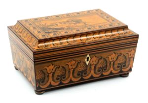 A fine whitewood and pen decorated card box with matching cribbage board probably relating to the