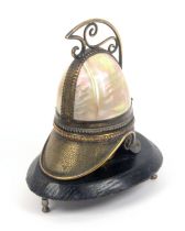 A perfume bottle holder in the style of Palais Royal fashioned as a classical helmet in mother of