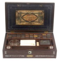 A rare Ackermann and Co paint box of large rectangular form, the front and lid inlaid with mother of