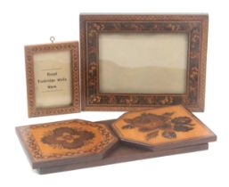 Two Tunbridge ware picture frames and a book slide, comprising a rectangular frame with bands of