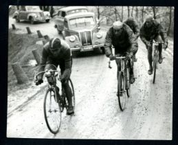 Fausto Coppi - 1946/58 - Collection of over twenty-five photographic prints, one with an autographed