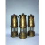 Three miners lamps