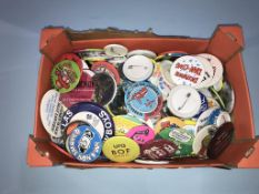 A collection of Vintage badges