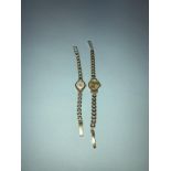 A ladies 9ct gold wristwatch and a ladies watch, with 9ct gold strap