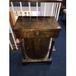 A 19th century mahogany side cabinet, with single drawer, below convex cupboard door, flanked by