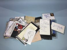 A collection of autographs, to include Cannon and Ball etc.