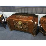 A carved Oriental chest, 100cm wide, 50cm deep, 58cm high