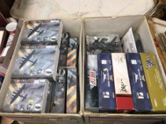 A collection of boxed Die Cast model planes, in two boxes