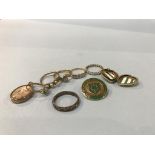 A 9ct gold enamel badge, 6.7g, and two 18ct gold rings, 5.2g etc.