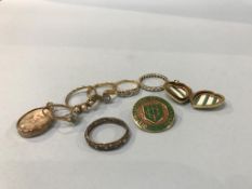A 9ct gold enamel badge, 6.7g, and two 18ct gold rings, 5.2g etc.