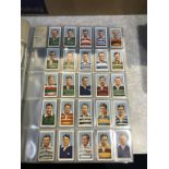 An album of cigarette cards, to include 21 full sets, including Football, Cricket, Racing, Boxing