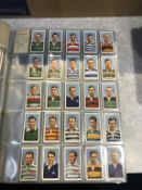 An album of cigarette cards, to include 21 full sets, including Football, Cricket, Racing, Boxing