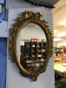 A gilt framed mirror