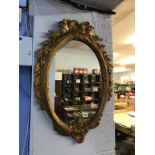 A gilt framed mirror