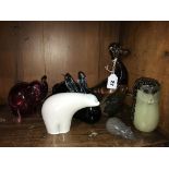 A collection of coloured glass animals