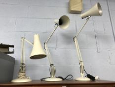 Three angle poise lamps