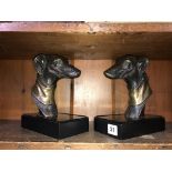A modern pair of decorative dog bookends