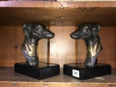 A modern pair of decorative dog bookends