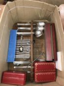 Assorted cutlery and two Cartier boxes