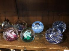 A collection of 17 Caithness and other Scottish paperweights